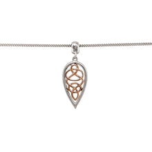 Load image into Gallery viewer, Add heritage symbolism and elegant contrast to your collection with this pre-owned Clogau Celtic knot pendant on an adjustable curb chain—perfect for timeless style with cultural significance.

Design: The pendant measures 2.9cm long including the bail and features an intricate Celtic knot crafted in sterling silver, beautifully accented with 9ct rose gold from the Clogau St. David’s mine.

