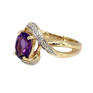 Preowned 9ct Yellow and White Gold Diamond & Amethyst Set Swirl Ring in size J with the weight 3.10 grams. The amethyst stone is 8mm by 6mm