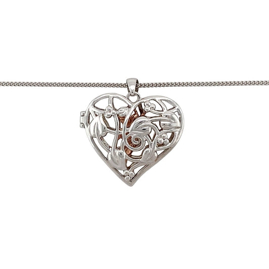 Hold a little magic close to your heart with this pre-owned 925 silver and 9ct rose gold Clogau Tree of Life heart fairy locket—an enchanting design blending heritage, symbolism, and imagination.

Design: This beautifully crafted locket features a heart-shaped design adorned with the iconic Tree of Life motif and a delicate fairy figure. Measuring 3.1cm long including the bail, it opens to hold a cherished photo or keepsake.
