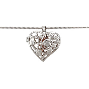 Hold a little magic close to your heart with this pre-owned 925 silver and 9ct rose gold Clogau Tree of Life heart fairy locket—an enchanting design blending heritage, symbolism, and imagination.

Design: This beautifully crafted locket features a heart-shaped design adorned with the iconic Tree of Life motif and a delicate fairy figure. Measuring 3.1cm long including the bail, it opens to hold a cherished photo or keepsake.

