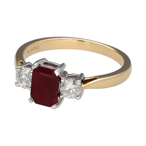 Bring timeless colour and classic sparkle to your jewellery collection with this new 9ct yellow gold diamond and ruby trilogy ring—a refined piece with elegant symmetry and rich gemstone contrast.

Design: Featuring a 7mm by 5mm emerald-cut ruby at the centre, flanked by two brilliant-cut diamonds totalling approximately 0.41ct, the trilogy design offers a bold yet balanced look.
