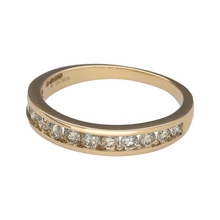 Load image into Gallery viewer, Bring timeless sparkle and bold elegance to your jewellery collection with this new 9ct yellow gold diamond band ring—a refined piece with brilliant detail and classic presence.

Design: The 4mm wide front of the band is set with diamonds totalling approximately 0.53ct, offering a radiant and balanced display of light-catching brilliance.
Material: Made from 9-carat yellow gold, the polished finish enhances the sparkle of the diamonds with a rich, warm glow.

