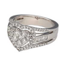 Load image into Gallery viewer, Bring bold sparkle and romantic elegance to your jewellery collection with this pre-owned 9ct white gold diamond heart cluster ring—a statement piece with eye-catching brilliance and timeless charm.

Design: The 13mm high front features a cluster of brilliant-cut diamonds forming a heart shape, with additional brilliant and baguette-cut diamonds set along the shoulders for added dimension and shine.

