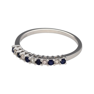 Bring refined sparkle and timeless elegance to your collection with this new 9ct white gold diamond and sapphire set band ring, offering a stunning blend of classic sophistication and vibrant detail—perfect for adding a touch of luxury to any look.

Design: The band features alternating sapphires and diamonds, with approximately 0.12ct of total diamond content, creating a graceful and eye-catching pattern that adds both colour and brilliance.
