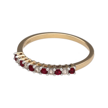 Load image into Gallery viewer, Bring rich colour and refined sparkle to your collection with this new 9ct yellow gold diamond and ruby set band ring, offering a stunning blend of classic elegance and vibrant detail—perfect for adding a luxurious touch to any look.

Design: The band features alternating rubies and diamonds, with approximately 0.12ct of total diamond content, creating a graceful and eye-catching pattern that combines vivid colour with brilliant sparkle.

