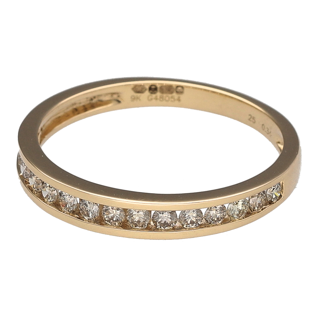 Bring refined sparkle and golden elegance to your collection with this new 9ct yellow gold diamond band ring—a timeless design with subtle brilliance.

Design: The ring features a 3mm wide band set with approximately 0.34ct of diamonds along the front, offering understated sparkle and sophistication.
Material: Made from 9-carat yellow gold, the polished finish complements the brilliance of the diamonds and adds classic appeal.
 