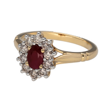 Load image into Gallery viewer, New 9ct Yellow and White Gold Diamond &amp; Ruby Set Cluster Ring in size M. The front of the ring is 13mm high and the ruby stone is approximately 6mm by 4mm. There is approximately 0.50ct of real natural diamonds set in the cluster in total. The diamonds are approximate clarity Si - i1 and colour K - M
