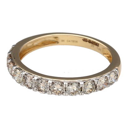 Add bold brilliance and timeless elegance to your collection with this pre-owned 9ct yellow gold diamond set band ring—perfect for standout sparkle in a refined design.

Design: The 3mm wide front of the band is set with eleven brilliant cut diamonds, offering continuous shimmer and classic symmetry.
Material: Made from 9-carat yellow gold, the polished finish enhances the radiant sparkle of the diamonds with a warm, golden glow.
