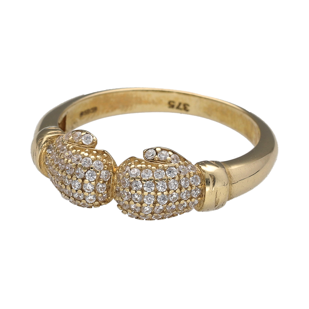 Bring sporty flair and knockout style to your collection with this new 9ct yellow gold and cubic zirconia set double boxing glove ring—a bold design that celebrates strength, resilience, and character.

Design: The ring features an 8mm high front with two finely detailed boxing gloves facing each other, accented with sparkling cubic zirconia for a touch of brilliance and impact.
