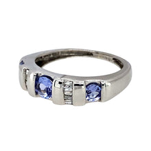 Load image into Gallery viewer, Preowned 9ct White Gold Diamond &amp; Tanzanite Set Band Ring in size J with the weight 2.30 grams. The center tanzanite stone is approximately 4.5mm diameter 
