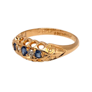 Preowned 18ct Yellow Gold Diamond & Sapphire Set Antique Ring in size K with the weight 2.80 grams. The ring is from approximately the early 1900s. The front of the ring is 7mm high and the center sapphire stone is 3mm by 2mm