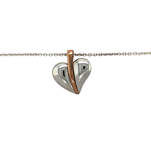 Preowned 925 Silver Clogau with 9ct Rose Gold Clogau Heart Leaf Pendant on an 18" Clogau silver chain with the weight 5.60 grams. The pendant is 2.1cm long including the bail