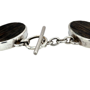 Preowned 925 Silver & Wooden Stone Set 7.5" Bracelet with the weight 47.40 grams. The wooden stones are each 24m by 16mm