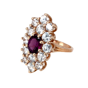 Preowned 9ct Rose Gold Pink Tourmaline & Cubic Zirconia Set Dress Ring in size N with the weight 5.90 grams. The front of the ring is 2.6cm high and the pink tourmaline stone is 8mm by 6mm