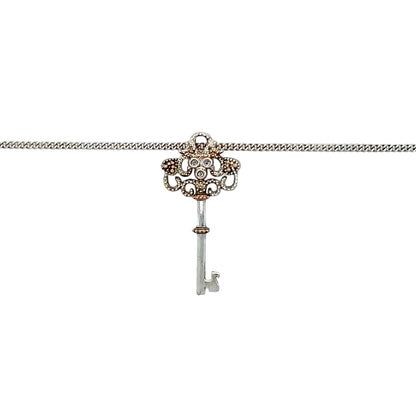 Preowned 925 Silver Clogau with 9ct Rose Gold Clogau Kensington Key Pendant on an 18" Silver Clogau curb chain. The necklace has the weight 4.70 grams and the pendant is 3cm long