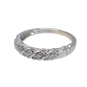 Preowned 9ct White Gold & Diamond Set Twist Band Ring in size N with the weight 2.40 grams. The front of the band is 4mm wide and the band contains approximately 13pt of diamond content