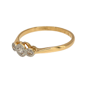 Preowned 18ct Yellow Gold & Platinum Diamond Set Trilogy Ring in size O with the weight 1.90 grams. The diamonds are set in a starburst setting and the front of the ring is 4mm high
