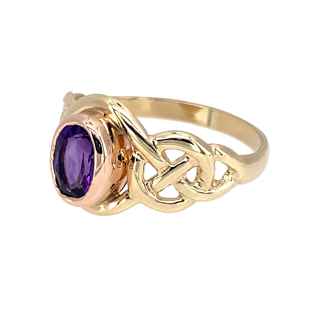 Preowned 9ct Yellow and Rose Gold & Amethyst Set Clogau Celtic Knot Birthstone Ring in size M with the weight 2.50 grams. The amethyst stone is 6mm by 4mm and the amethyst is the birthstone for February