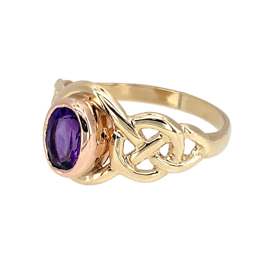 Preowned 9ct Yellow and Rose Gold & Amethyst Set Clogau Celtic Knot Birthstone Ring in size M with the weight 2.50 grams. The amethyst stone is 6mm by 4mm and the amethyst is the birthstone for February
