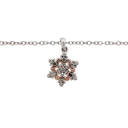 Preowned 925 Silver Clogau with 9ct Rose Gold & Cubic Zirconia Clogau Snowflake Pendant on an 18" - 22" Clogau adjustable curb chain with the weight 3.80 grams. The pendant is 2.2cm long including the bail