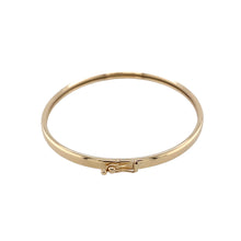 Load image into Gallery viewer, Preowned 9ct Yellow Gold Plain Oval Children&#39;s Hinged Bangle with the weight 2.70 grams and bangle width 3mm. The bangle diameter is 5.2cm
