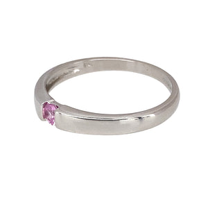 Preowned 9ct White Gold & Pink Stone Set Band Ring in size L with the weight 1.60 grams. The pink stone is 3mm diameter