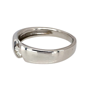 Preowned 14ct White Gold & Diamond Tension Set Band Ring in size K with the weight 3.80 grams. The band is 5mm wide at the front and the diamond is approximately 10pt