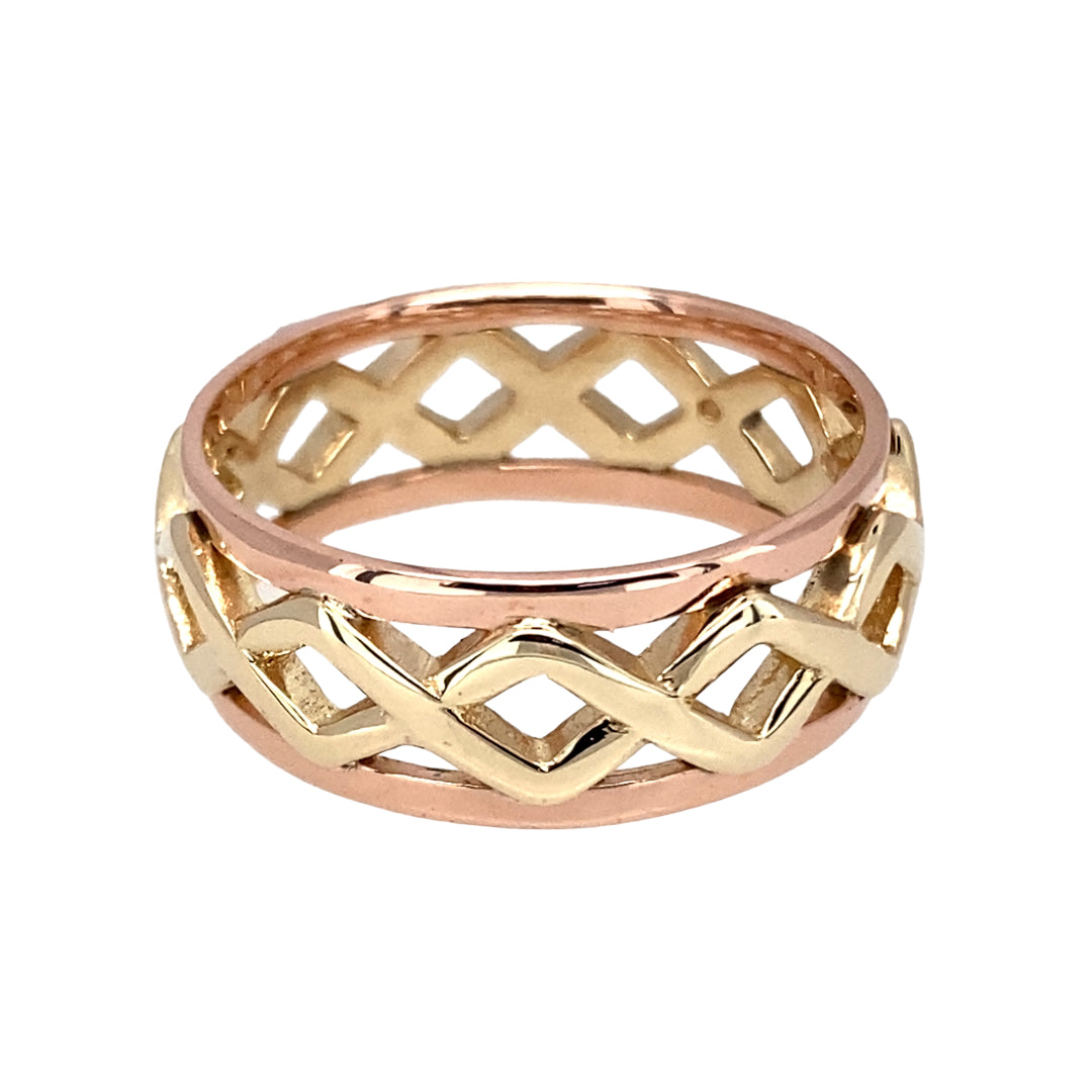 Bring timeless craftsmanship and heritage design to your collection with this pre-owned 9ct yellow and rose gold Clogau Weave band ring, a bold and intricate piece with lasting appeal.

Design: The band measures 8mm wide and features an interwoven weave pattern, creating a textured and distinctive look.
Material: Made from 9-carat yellow and rose gold, the two-tone finish highlights the intricate design and adds depth and contrast.
