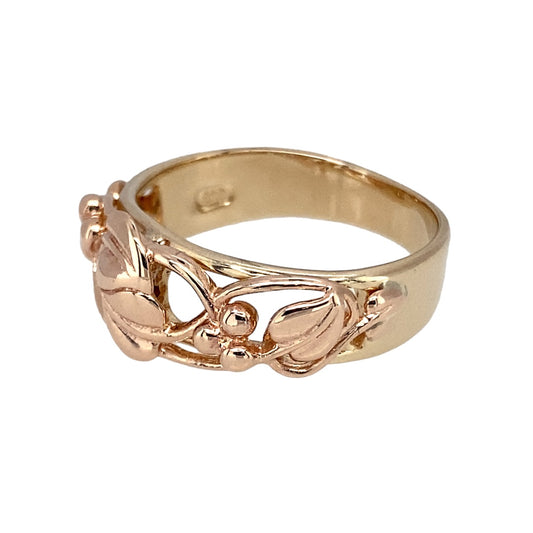 Bring symbolic elegance and heritage style to your collection with this pre-owned Clogau Tree of Life ring in 9ct yellow and rose gold—a meaningful design representing growth, strength, and harmony.

Design: The ring features an 8mm wide front adorned with the iconic Tree of Life motif, blending yellow and rose gold for a distinctive two-tone finish.
Material: Made from 9-carat yellow and rose gold, the polished surface enhances the intricate detailing and warm tones of the design.