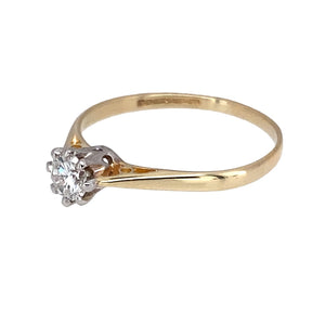 Preowned 9ct Yellow and White Gold & Diamond Set Solitaire Ring in size L with the weight 1 gram. The brilliant cut diamond is approximately 28pt with approximate clarity Si and colour K - M