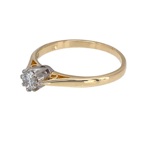 Preowned 9ct Yellow and White Gold & Diamond Set Solitaire Ring in size O with the weight 1.80 grams. The brilliant cut diamond is approximately 25pt with approximate clarity i1 and colour K - M