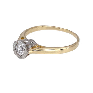 Preowned 9ct Yellow and White Gold & Diamond Illusion Set Solitaire Ring in size K to L with the weight 1.50 grams. The diamond is approximately 15pt with approximate clarity i2