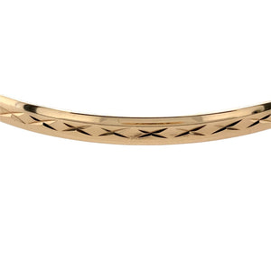 Preowned 9ct Yellow Solid Gold Patterned Bangle with the weight 6 grams. The bangle width 4mm and the bangle diameter is 6.7cm