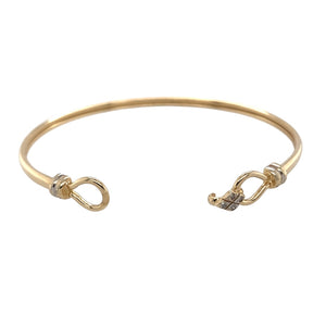 Preowned 9ct Yellow Gold & Diamond Set Bangle with the weight 4.90 grams. The bangle has the diameter is 5.8cm and the front of the bangle is 7mm high