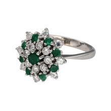 Load image into Gallery viewer, Preowned 18ct White Gold Diamond &amp; Emerald Set Cluster Ring in size O with the weight 5.60 grams. The front of the ring is 17mm high and the emerald stones are either 4mm diameter or 2mm diameter. There is approximately 56pt of diamond content
