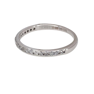 Preowned 18ct White Gold & Diamond Set Band Ring in size K with the weight 1.50 grams. The band is 2mm wide and there is approximately 15pt of diamond content