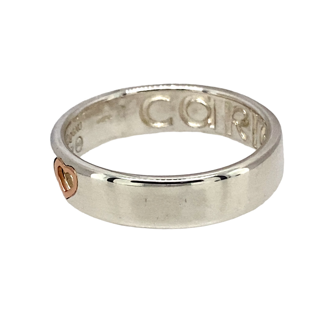 Preowned 925 Silver with 9ct Rose Gold Clogau Cariad Heart 'Take my Heart' Band Ring in size N with the weight 3.80 grams. The band is approximately 5mm wide