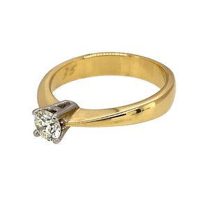 Preowned 18ct Yellow and White Gold & Diamond Set Solitaire Ring in size N with the weight 4.30 grams. The brilliant cut diamond is approximately 35pt with approximate clarity Si1 and colour K - M 