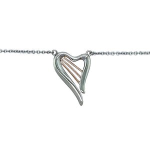 Preowned 925 Silver and 9ct Clogau Gold Clogau Heart Strings 17" Necklace with the weight 5.70 grams. The heart is 2.5cm by 1.7cm