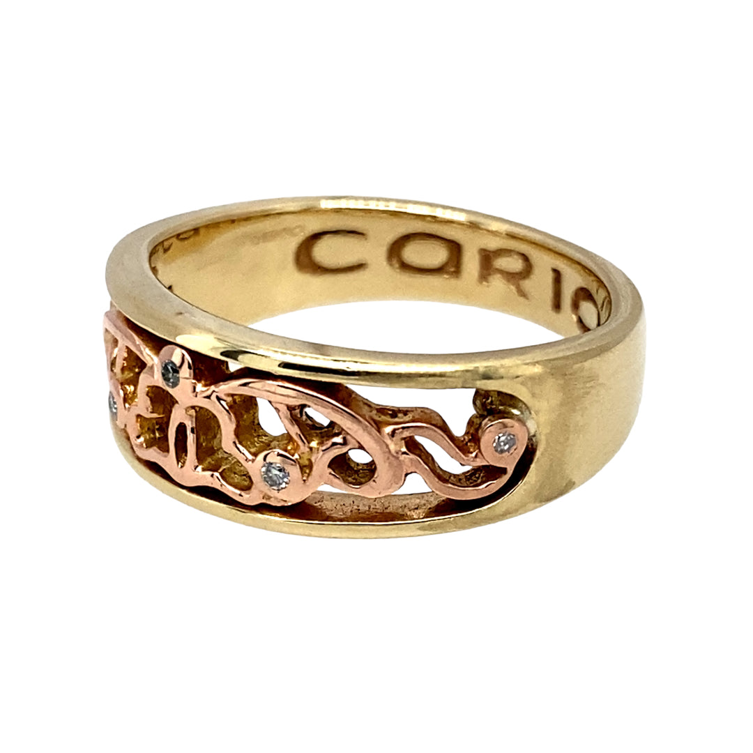 Preowned 9ct Yellow and Rose Gold & Diamond Set Clogau Cariad Band Ring in size P with the weight 5.90 grams. The front of the band is 8mm wide