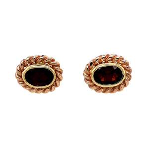 Preowned 9ct Yellow and Rose Gold & Garnet Clogau Stud Earrings with the weight 3.80 grams. The garnet stones are each 7mm by 4mm