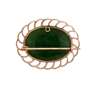 Preowned 9ct Rose Gold & Jade Oval Scalloped Edge Brooch with the weight 6.50 grams. The jade stone is 19mm by 25mm