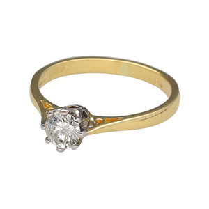 Preowned 18ct Yellow and White Gold & Diamond Set Solitaire Ring in size L with the weight 2.40 grams. The brilliant cut diamond is approximately 36pt with approximate clarity i2 and colour K - M