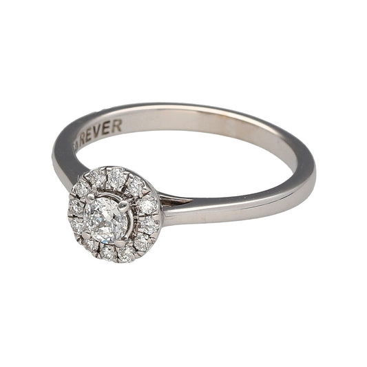 Preowned 18ct White Gold & Diamond Set Halo Set Ring in size K with the weight 2.80 grams. There is approximately 25pt of diamond content in total