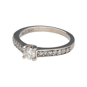 Preowned 9ct White Gold & Diamond Set Solitaire Ring with diamond set shoulders. The ring is in size K with the weight 2.40 grams. There is approximately 50pt of diamond content in total at approximate clarity Si and colour K - M