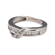 Load image into Gallery viewer, Preowned 14ct White Gold &amp; Diamond Wrap Over Band Ring in size L with the weight 4.70 grams. The ring is made up of baguette cut diamonds in the main band and a ribbon of brilliant cut diamonds overlapping. There is approximately 41pt of diamond content at approximate clarity i1 - i2 and colour K - N
