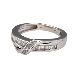 Preowned 14ct White Gold & Diamond Wrap Over Band Ring in size L with the weight 4.70 grams. The ring is made up of baguette cut diamonds in the main band and a ribbon of brilliant cut diamonds overlapping. There is approximately 41pt of diamond content at approximate clarity i1 - i2 and colour K - N