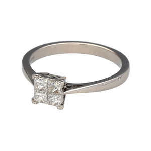 Preowned 18ct White Gold & Princess Cut Diamond Illusion Set Solitaire Ring in size P with the weight 3.50 grams. There is approximately 52pt of diamond content in total but with the illusion set the ring gives the impression of a 72pt diamond. The diamonds are approximately clarity Si1