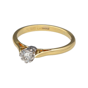 Preowned 18ct Yellow and White Gold & Diamond Set Solitaire Ring in size O with the weight 3 grams. The brilliant cut diamond is approximately 25pt and is approximate clarity Si1