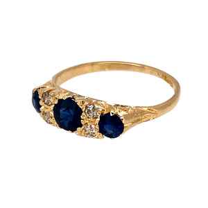Preowned 18ct Yellow Gold Diamond & Sapphire Set Antique Style Ring in size N with the weight 2.40 grams. The center sapphire stone is 5mm diameter and the side stones are each approximately 3.5mm diameter